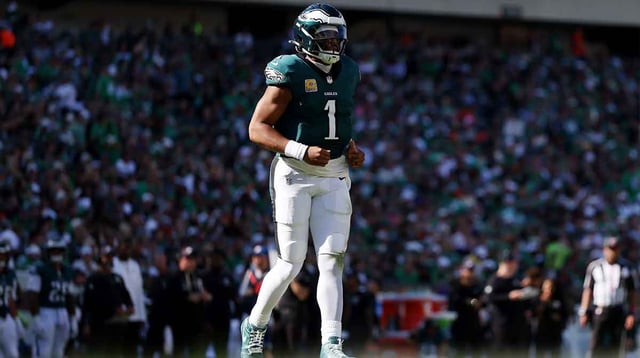 Oct 5, 2025; Philadelphia, Pennsylvania, USA; Philadelphia Eagles quarterback Jalen Hurts (1) runs on field against the Denver Broncos in the second half at Lincoln Financial Field. Mandatory Credit: Bill Streicher-Imagn Images