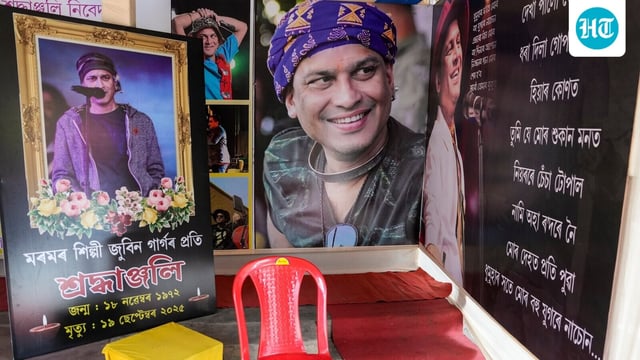A pavilion with photographs of deceased singer Zubeen Garg, at the entrance of a community Durga Puja pandal, in Guwahati.