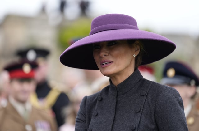 WINDSOR, ENGLAND - SEPTEMBER 17: First Lady Melania Trump meets military personal after a Beating Retreat military ceremony at Windsor Castle, Berkshire, on day two of the president's second state visit to the UK on September 17, 2025 in Windsor, England. (Photo by Andrew Matthews - WPA Pool/Getty Images)