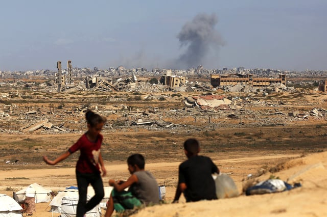 Israel has pressed ahead with an aerial and ground assault on Gaza City amid the talks.