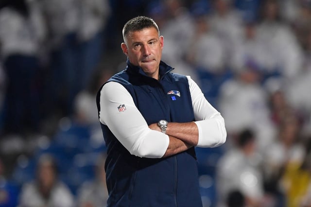 New England Patriots head coach Mike Vrabel watches warmups before his team went out and upset the Buffalo Bills last Sunday in Orchard Park, N.Y. (AP Photo/Adrian Kraus)