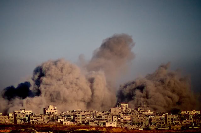 Smoke rises to the sky following an Israeli military strike in the northern Gaza Strip, as seen from southern Israel, Wednesday, Oct. 8, 2025. (AP Photo/Emilio Morenatti)