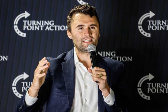 FILE - Charlie Kirk speaks during a town hall meeting on March 17, 2025, in Oconomowoc, Wis. (AP Photo/Jeffrey Phelps, File)