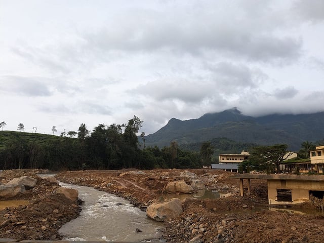 A view of the landslide debris from the Chooralmala - Mundakkai bridge. 