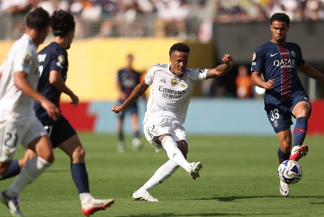 Soccer Football - FIFA Club World Cup - Semi Final - Paris St Germain v Real Madrid - MetLife Stadium, East Rutherford, New Jersey, U.S. - July 9, 2025 Real Madrid's Eder Militao in action with Paris St Germain's Warren Zaire-Emery REUTERS/Lee Smith