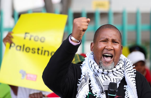 Nelson Mandela's eldest grandson, Mandla Mandela, gestures during a protest by Palestinian supporters calling for Miss SA, Lalela Mswane to withdraw from the Miss Universe pageant in Israel, outside the Miss South Africa headquarters in Johannesburg, South Africa, November 19, 2021. REUTERS/Siphiwe Sibeko