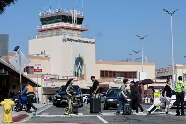 Passengers arrive and depart at Hollywood Burbank Airport on Tuesday.