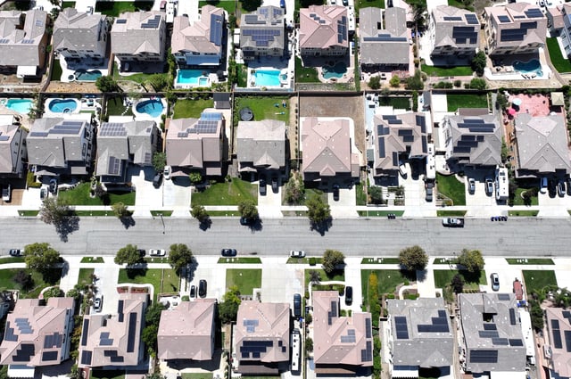 An aerial view of residential homes, many with solar panels, on September 17, 2025, in Fontana, California. (Mario Tama/Getty Images)