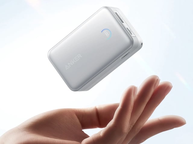 The Anker Nano Portable Charger hovering over a hand