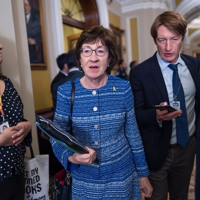 As the government shutdown moves into the second week, Senate Appropriations Committee Chairwoman Susan Collins, R-Maine, center, has suggested pushing ahead with a group of bipartisan spending bills that are pending and a then securing a commitment to discuss the health care issue as a way out of the impasse, at the Capitol in Washington, Tuesday, Oct. 7, 2025. (AP Photo/J. Scott Applewhite)