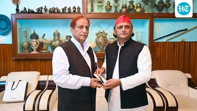 In this image received on Oct. 8, 2025, Samajwadi Party President Akhilesh Yadav with senior party leader Azam Khan during a meeting, in Rampur, Uttar Pradesh. (Handout via PTI Photo)
