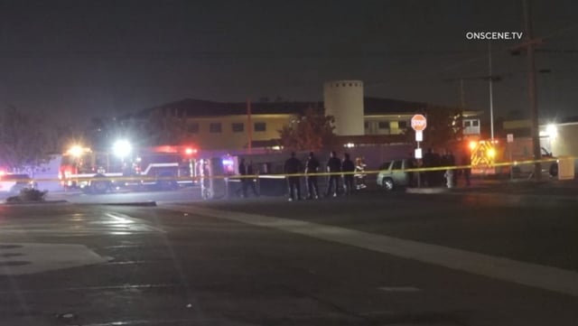 Santa Ana police investigate the scene of a crash between a SUV and a food truck that killed the food truck driver at Warner Avenue and Broadway Tuesday night, Oct. 7. (Photo by OnScene TV)