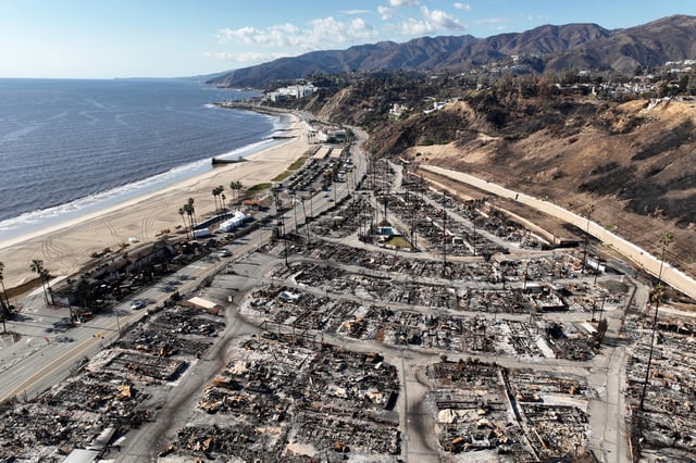 FILE - An aerial view shows the devastation left by the Palisades Fire in the Pacific Palisades section of Los Angeles, Jan. 27, 2025. (AP Photo/Jae C. Hong, file)