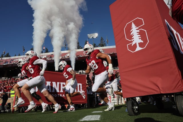 The Stanford Cardinal run onto the field to take on the San Jose State Spartans in a college football game at Stanford Stadium in Stanford, Calif., on Saturday, Sept. 27, 2024. (Ray Chavez/Bay Area News Group)