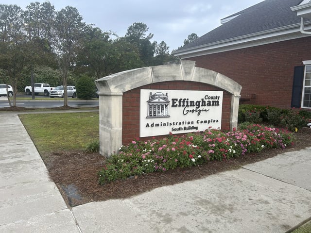 The outside of the Effingham County Board of Commissioner's building is photographed.