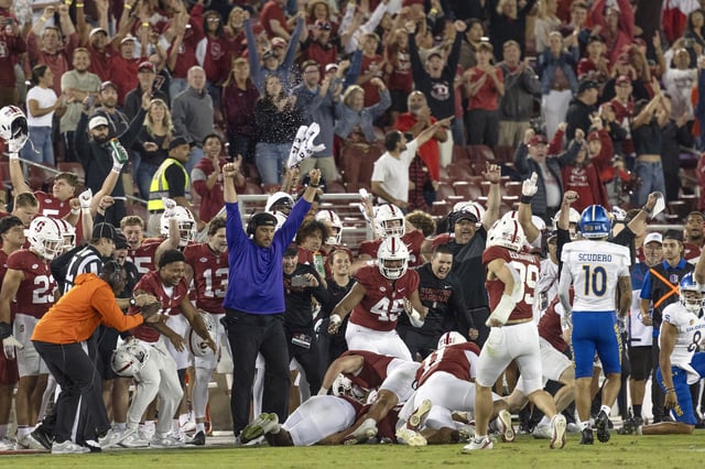 Sep 27, 2025; Stanford, California, USA;  Stanford Cardinal sideline erupt in cheers after defeating the San Jose State Spartans at Stanford Stadium. Mandatory Credit: Stan Szeto-Imagn Images