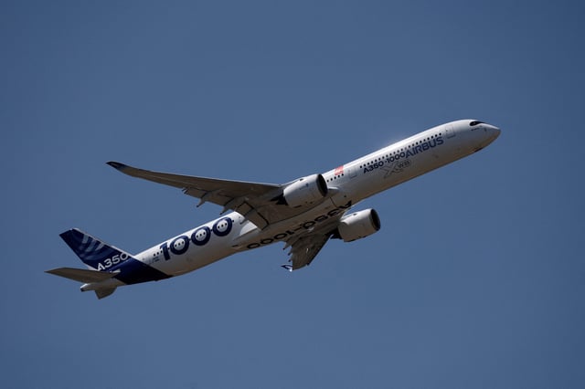 An Airbus A350-1000 passenger aircraft during a flying display at the 55th International Paris Airshow at Le Bourget Airport near Paris, France, June 18, 2025. REUTERS/Benoit Tessier/File Photo