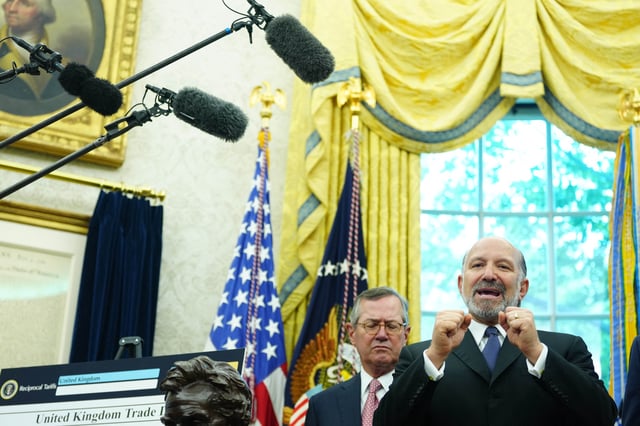 Commerce Secretary Howard Lutnik makes comments after US President Donald Trump announced a trade agreement between the United States and the United Kingdom in the Oval Office of the White House on Thursday, May 8, 2025. 
