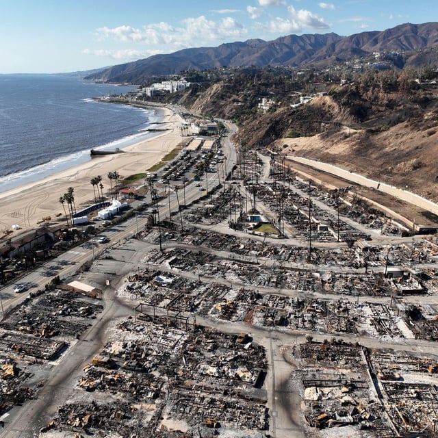 FILE - An aerial view shows the devastation left by the Palisades Fire in the Pacific Palisades section of Los Angeles, Jan. 27, 2025. (AP Photo/Jae C. Hong, file)