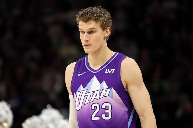 Lauri Markkanen #23 of the Utah Jazz looks on during the first quarter against the Minnesota Timberwolves at Target Center on March 16, 2025 in Minneapolis, Minnesota.
