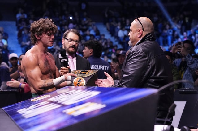 HOOK hands retires the FTW Championship on AEW Dynamite, handing it to his father, ECW legend Taz.