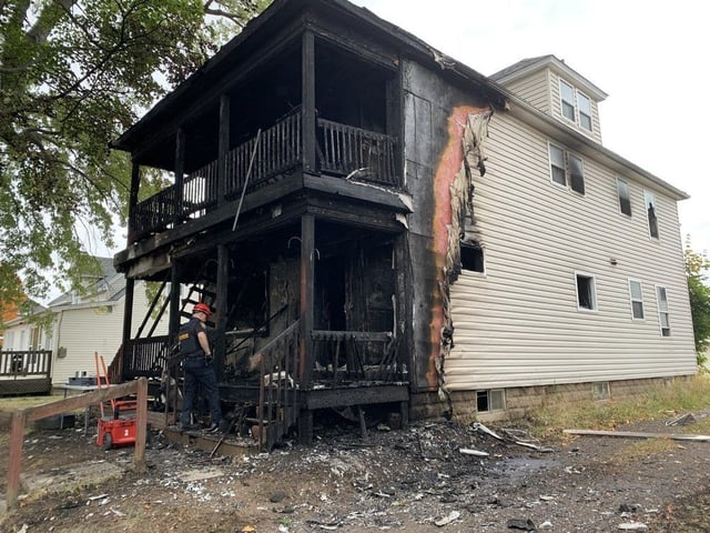  The Moncton Fire Department is investigating the cause of a fire that resulted in two people being rescued and two firefighters being treated for minor injuries Wednesday morning.