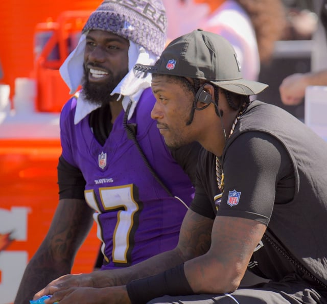 Ravens injuried quarterback Lamar Jackson on the sideline during the Texans game at M&T Bank Stadium. (Karl Merton Ferron/Staff)
