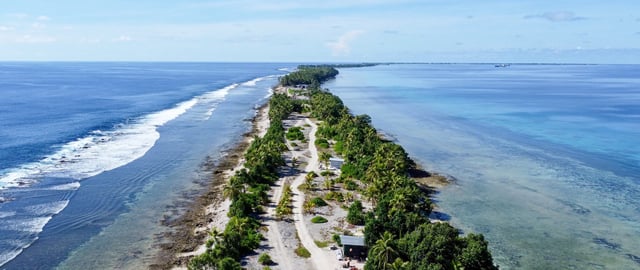 Funafuti, the capital of Tuvalu, an island nation in the Pacific with a population of 11,000 people who are experiencing firsthand the effects of a destabilized climate, including saltwater inundation, coastal erosion, food and water scarcity, worsening king tides and stronger storms. The people of Tuvalu need to be able to stay on their islands with dignity, or if worse comes to worst and they choose to leave, to be able to migrate with dignity.