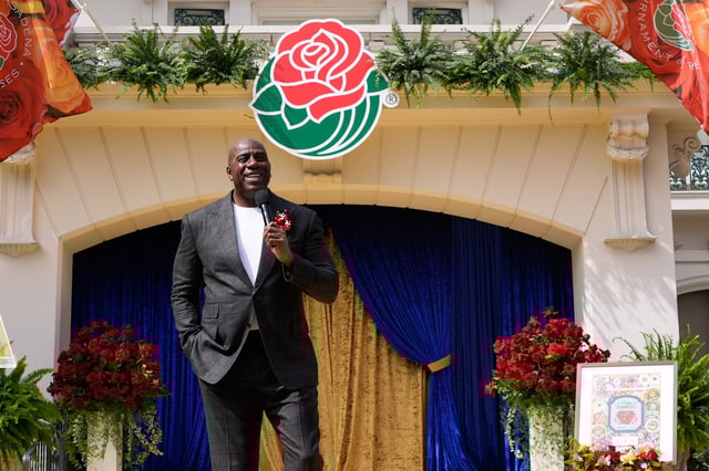 Basketball Hall of Famer Earvin "Magic" Johnson speaks after he was introduced as the grand marshal for the 137th Rose Parade, Wednesday, Oct. 8, 2025, in Pasadena, Calif. (AP Photo/Damian Dovarganes)