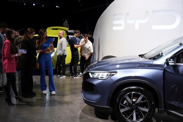 People attend the launch event of Chinese electric vehicle (EV) maker BYD in Buenos Aires, Argentina, October 8, 2025. REUTERS/Alessia Maccioni