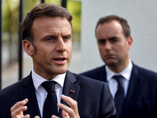 Bergerac (France), 11/04/2024.- France's President Emmanuel Macron (L) addresses the media as France's Minister for the Armed Forces Sebastien Lecornu (R) listens during a visit to the powders and explosives company Eurenco plant in Bergerac, southwestern France, 11 April 2024. (Francia) EFE/EPA/LUDOVIC MARIN / POOL MAXPPP OUT