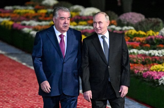 Tajik President Emomali Rahmon welcomes Russian President Vladimir Putin during his arrival at the Dushanbe International Airport in Dushanbe, Tajikistan October 8, 2025. Sputnik/Kristina Kormilitsyna/Pool via REUTERS