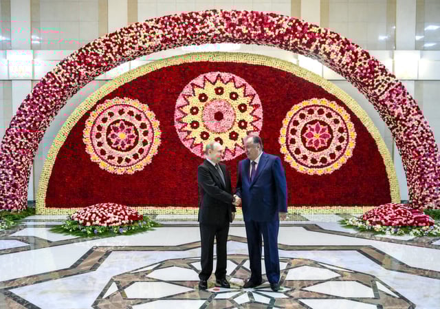 Russian President Vladimir Putin shakes hands with Tajik President Emomali Rahmon during a meeting in Dushanbe, Tajikistan October 8, 2025. Sputnik/Grigory Sysoev/Pool via REUTERS