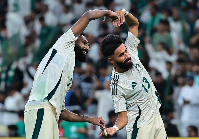 Soccer Football - FIFA World Cup - AFC Qualifiers - Group B - Indonesia v Saudi Arabia - King Abdullah Sports City, Jeddah, Saudi Arabia - October 8, 2025 Saudi Arabia's Feras Al-Brikan celebrates scoring their third goal with Saudi Arabia's Nawaf Boushal REUTERS/Stringer