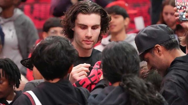 Apr 16, 2025; Chicago, Illinois, USA; Chicago Bulls guard Josh Giddey (3) signs autographs before the game against the Miami Heat at United Center. Mandatory Credit: David Banks-Imagn Images