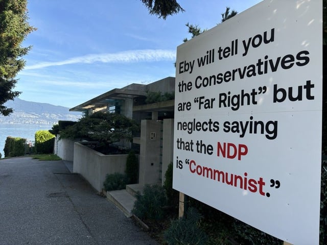A sign outside Vancouver billionaire Chip Wilson's home claimed that the B.C. NDP are Communists as voters prepared for the Oct. 19, 2024, provincial election.