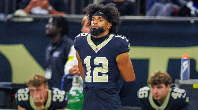 Aug 17, 2025; New Orleans, Louisiana, USA; New Orleans Saints wide receiver Chris Olave (12) and punter Kai Kroeger (32) and punter James Burnip (46) looks on against the Jacksonville Jaguars during the first half at Caesars Superdome. Mandatory Credit: Stephen Lew-Imagn Images