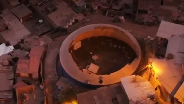 Reservorio de agua quedó con el techo descubierto, por lo que vecinos temen la propagación de zancudos transmisores del dengue. Foto: captura / América Noticias