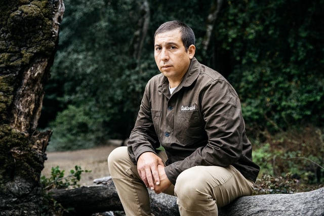 Fiction writer and MacArthur Fellow Tommy Orange sits for a portrait.