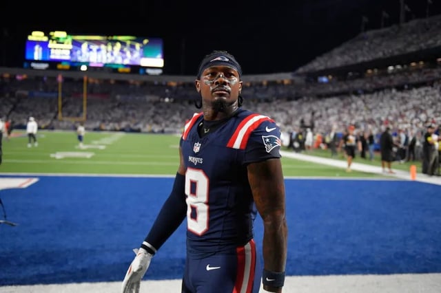 New England Patriots wide receiver Stefon Diggs (8) before an NFL football game against the Buffalo Bills, Sunday, Sept. 5, 2025, in Orchard Park, N.Y. (AP Photo/Adrian Kraus)