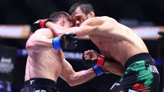 Paul Hughes and Usman Nurmagomedov collide during their fight at PFL Champions Series 3. Credit: Francois Nel/Getty Images