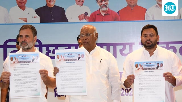 Congress party president Mallikarjun Kharge with leader of Opposition in Lok Sabha and Congress leader Rahul Gandhi and RJD leader Tejashwi Yadav 