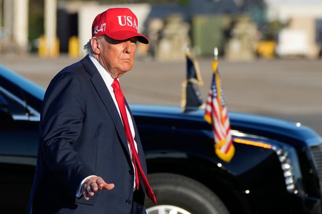 President Donald Trump walks to board Air Force One at Naval Station Norfolk Chambers Field in Norfolk, Va., Sunday, Oct. 5, 2025. (AP Photo/Alex Brandon)