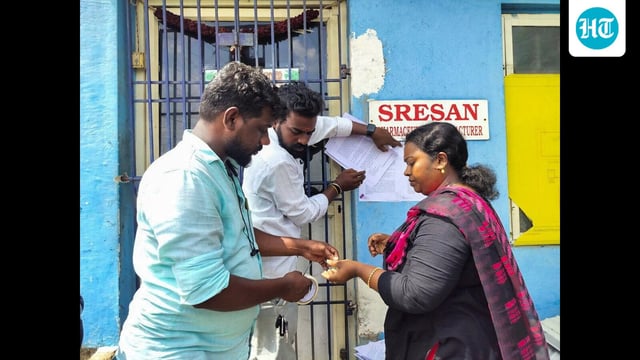 A Tamil Nadu health official sticks a notice outside the Sresan Pharmaceutical factory whose Coldrif cough syrup has been linked to the deaths of 17 children in Madhya Pradesh, in Chennai. (REUTERS)