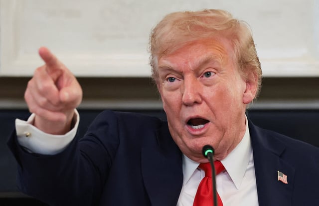 President Donald Trump points a finger as he speaks during a roundtable on antifa, an anti-fascist movement he designated a domestic "terrorist organization" via executive order on September 22, at the White House in Washington, D.C., U.S., October 8, 2025.
