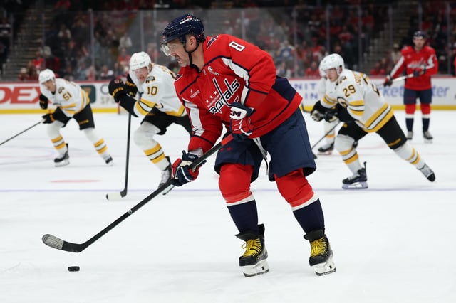WASHINGTON, DC - OCTOBER 02: Alex Ovechkin #8 of the Washington Capitals skates with the puck against the Boston Bruins in the second period during a preseason game at Capital One Arena on October 2, 2025 in Washington, DC. (Photo by Patrick Smith/Getty Images)