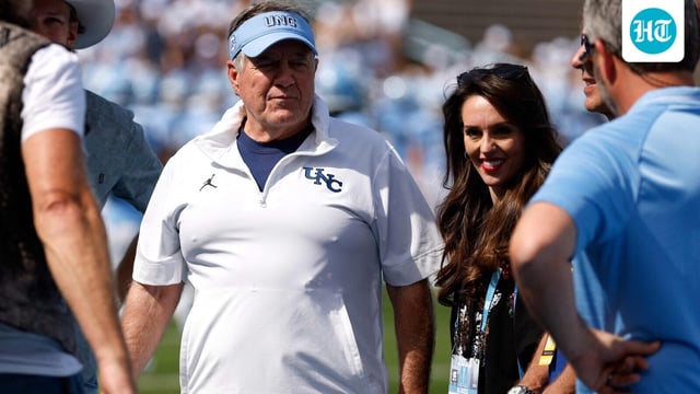 Head coach Bill Belichick of the North Carolina Tar Heels and Jordon Hudson look on prior to the game against the Richmond Spiders 