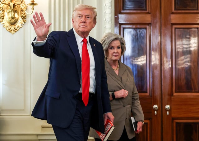 President Donald Trump departs with White House Chief of Staff Susie Wiles following a roundtable discussion in the State Dining Room of the White House on Oct. 8, 2025.