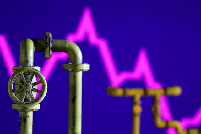 Model of natural gas pipeline and decreasing stock graph, July 18, 2022. REUTERS/Dado Ruvic/Illustration