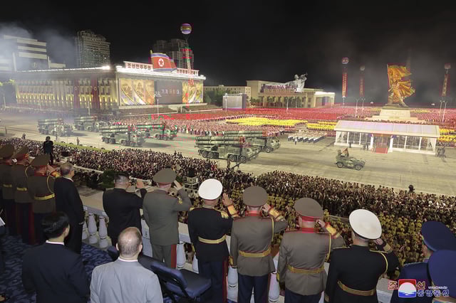 In this photo provided by the North Korean government, North Korean leader Kim Jong Un, attends a military parade to mark the 70th anniversary of the armistice that halted fighting in the 1950-53 Korean War, on Kim Il Sung Square in Pyongyang, North Korea, on July 27, 2023.